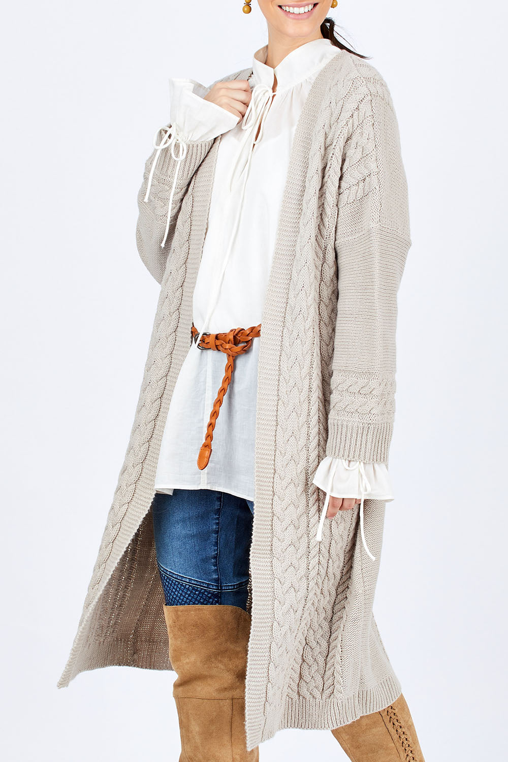 Model Georgia wearing size S of the Walk In The Park Cardi in colour Sand, from the front, cropped image