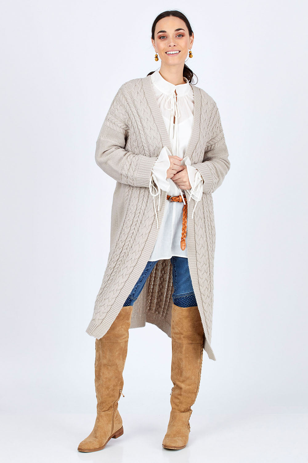 Model Georgia wearing size S of the Walk In The Park Cardi in colour Sand, from the front, showing the whole outfit