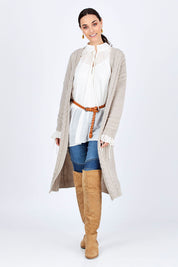 Model Georgia wearing size S of the Walk In The Park Cardi in colour Sand, from the front, showing the whole outfit