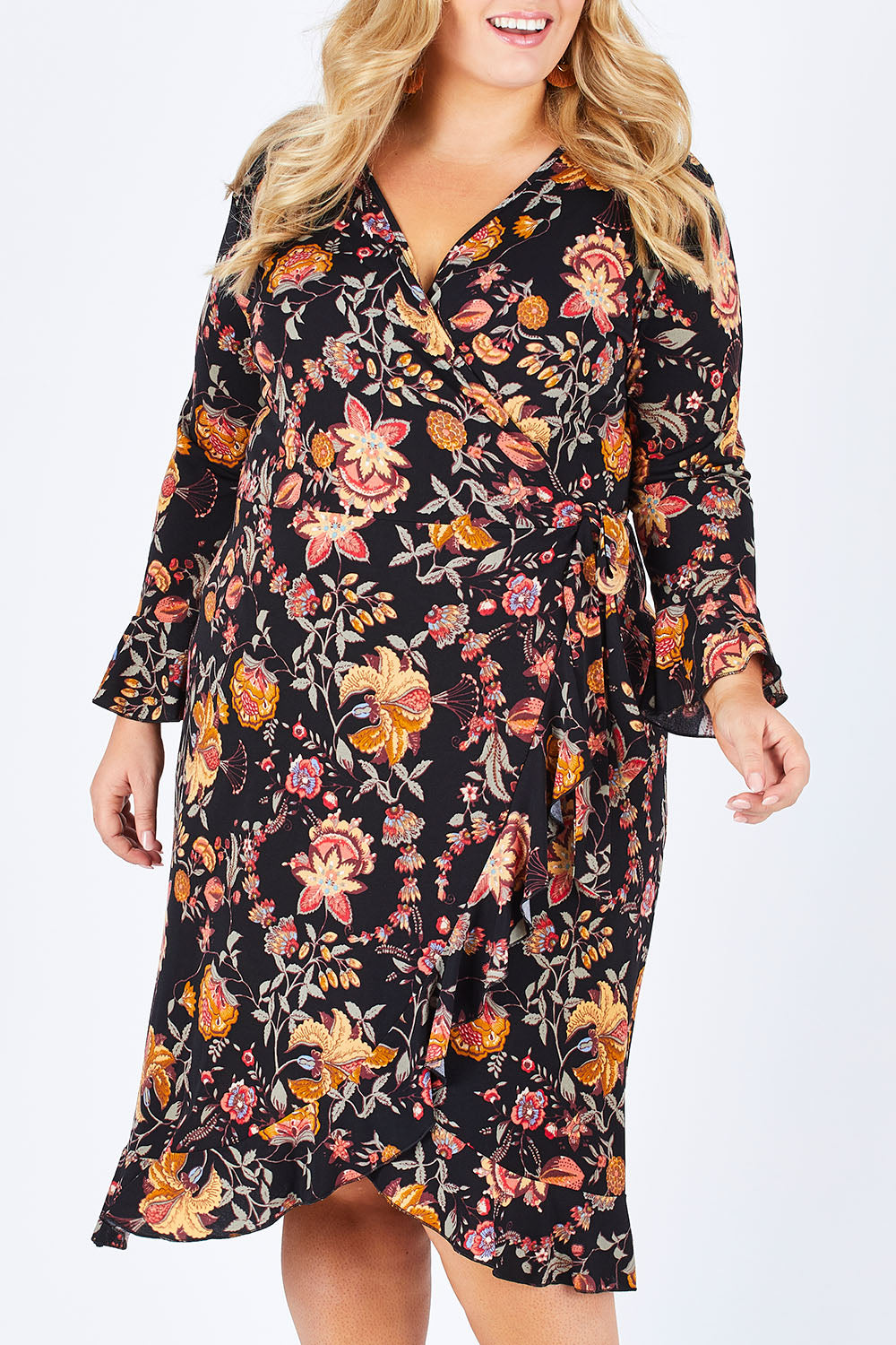 Model Sophie wearing size 18 of the Swanning Around Wrap Dress in colour BlackOrch (Black), from the front, cropped image