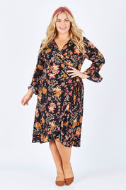 Model Sophie wearing size 18 of the Swanning Around Wrap Dress in colour BlackOrch (Black), from the front, showing the whole outfit