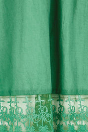 Product shot of the Spring Day Cotton Throw – Green in colour Green, showing detail