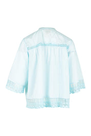 Product shot of the Spring Day Cotton Throw in colour Sky (Blue), from the back