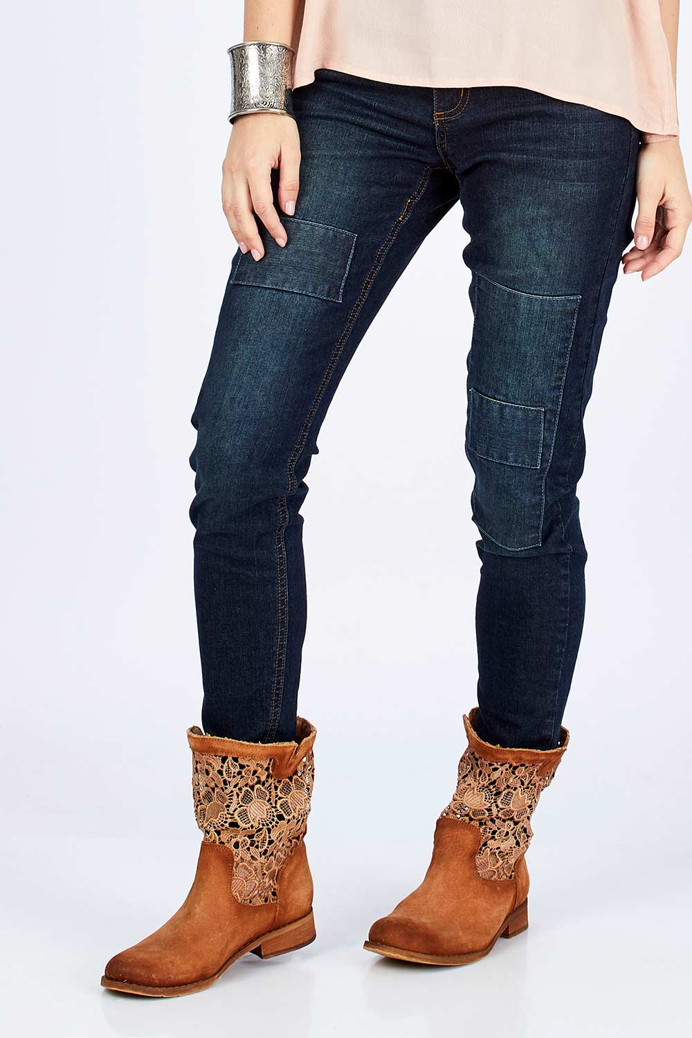 Model Georgia wearing size 10 of the You Patched Me All Up Jeans in colour Denim (Blue), from the front, cropped image