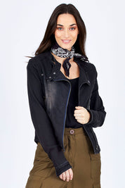 Model Georgia wearing size 10 of the Road Less Travelled Jacket in colour Black (Black), from the front, cropped image