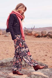 Model Marnee wearing size 10 of the Road Less Travelled Jacket in colour Black (Black), from the front, showing the whole outfit