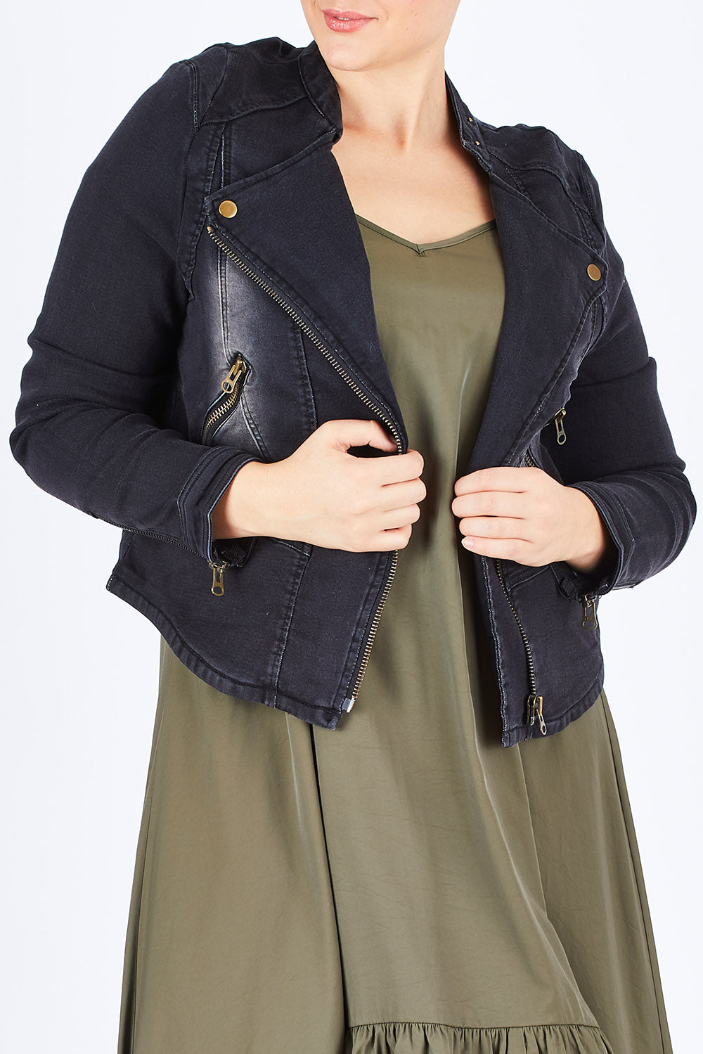 Model Stefania wearing size 14 of the Road Less Travelled Jacket in colour Black (Black), from the front, cropped image