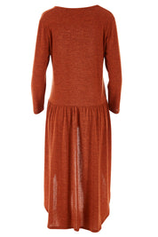 Product shot of the Falling For You Tunic in colour Rust, from the back