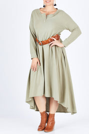Model Stefania wearing size 14 of the Picking Wildflowers Dress in colour Pumice, from the front, cropped image