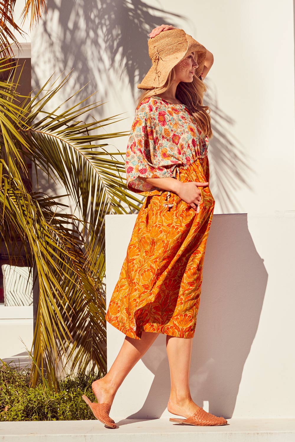 Model Marnee wearing size 10 of the You Are A Firecracker Dress in colour Firecrack, from the front, showing the whole outfit