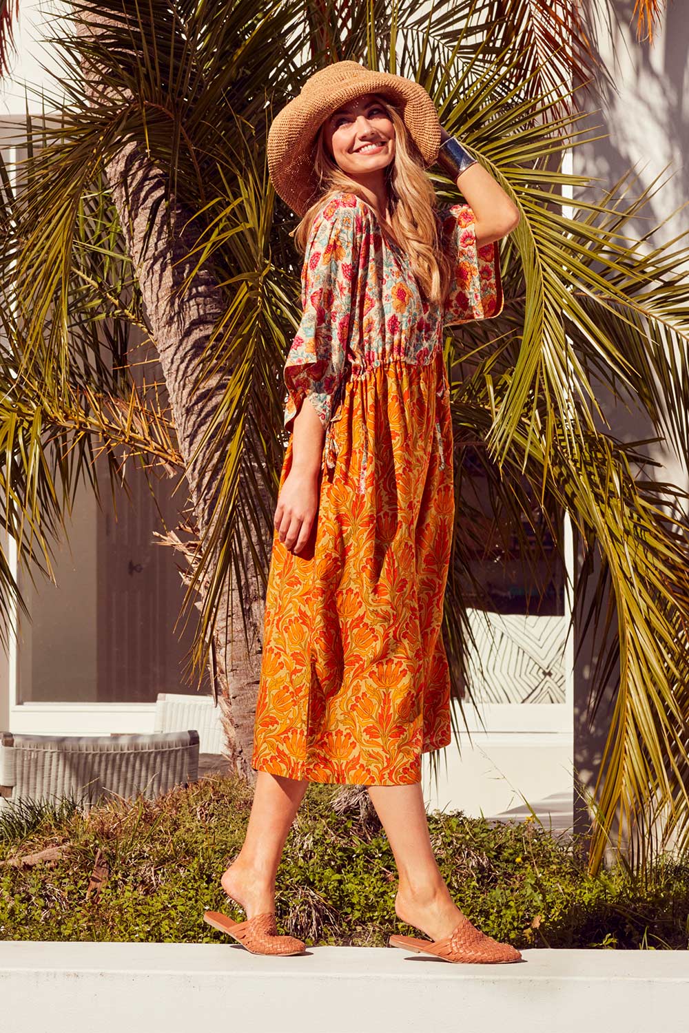 Model Marnee wearing size 10 of the You Are A Firecracker Dress in colour Firecrack, from the front, showing the whole outfit