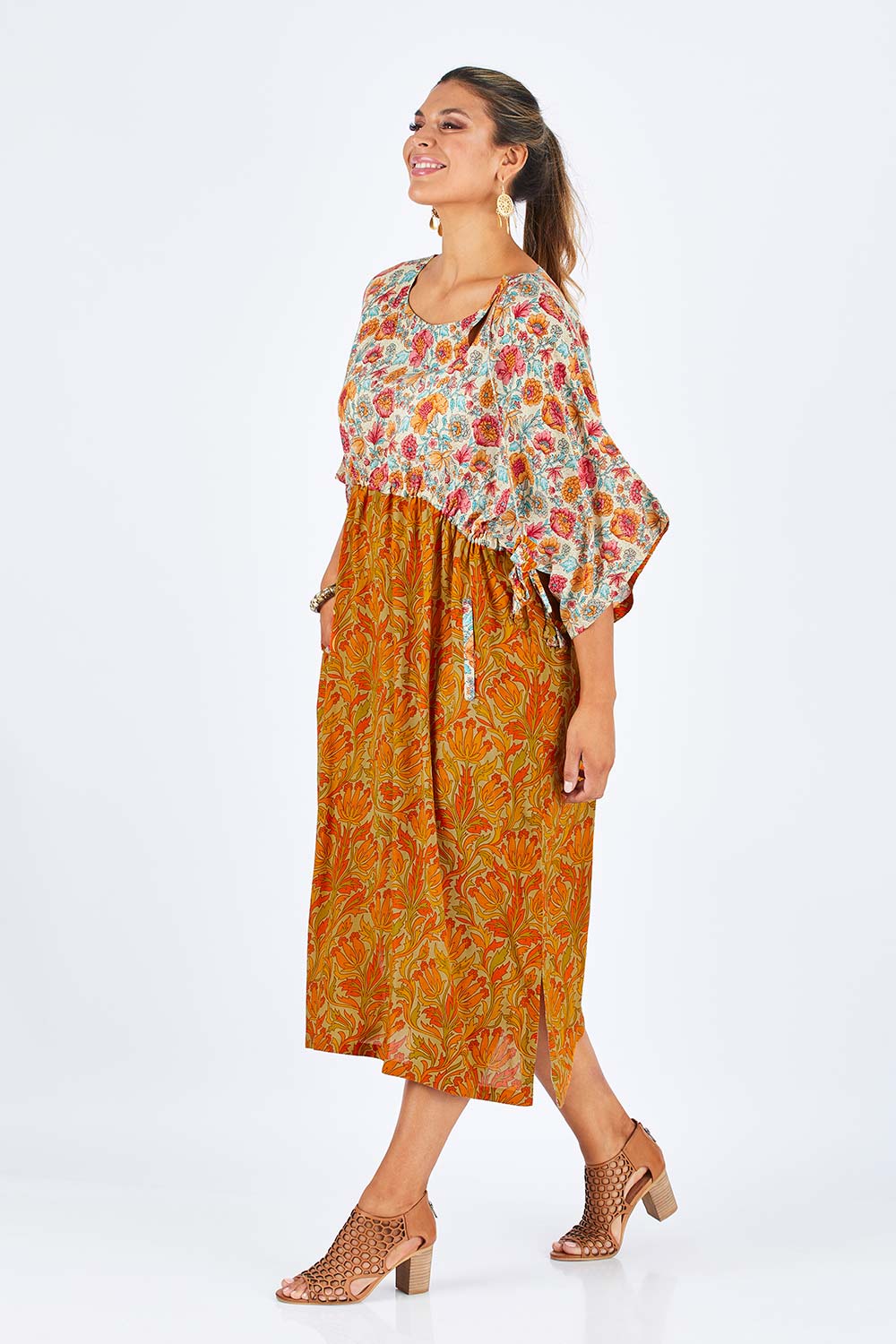 Model Palatina wearing size 14 of the You Are A Firecracker Dress in colour Firecrack, from the front, showing the whole outfit