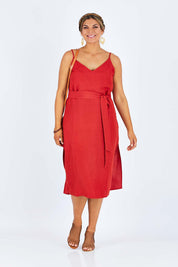 Model Palatina wearing size 14 of the Sunshine And Happiness Dress in colour Ketchup (Red), from the front, showing the whole outfit