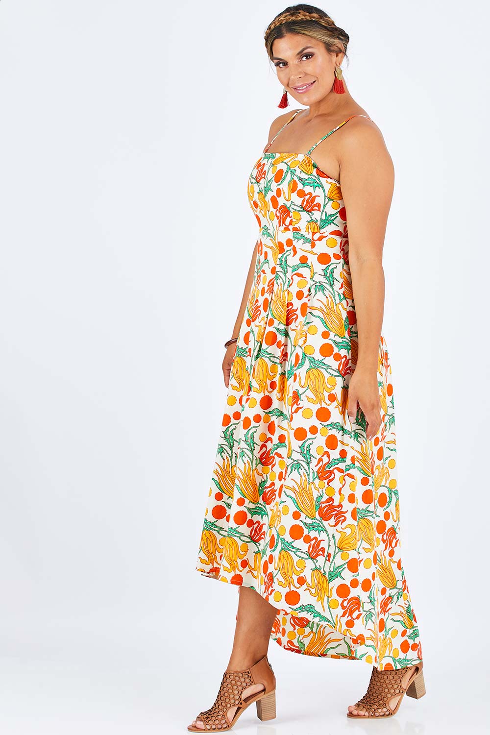 Model Palatina wearing size 14 of the Dancing By Sunset Dress in colour Floralspot, from the front, showing the whole outfit
