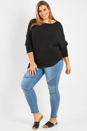 Model Fiona wearing size 16 of the Snuggle Up Jumper in colour Black (Black), from the front, showing the whole outfit