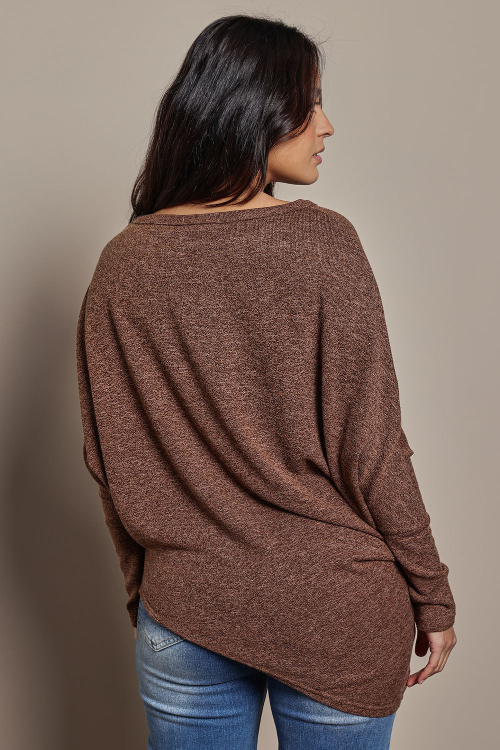 Model Tahnee wearing size 10 of the Snuggle Up Jumper in colour Chocolate, from the back