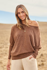 Model Tegan wearing size 10 of the Snuggle Up Jumper in colour Chocolate, from the front, showing the whole outfit
