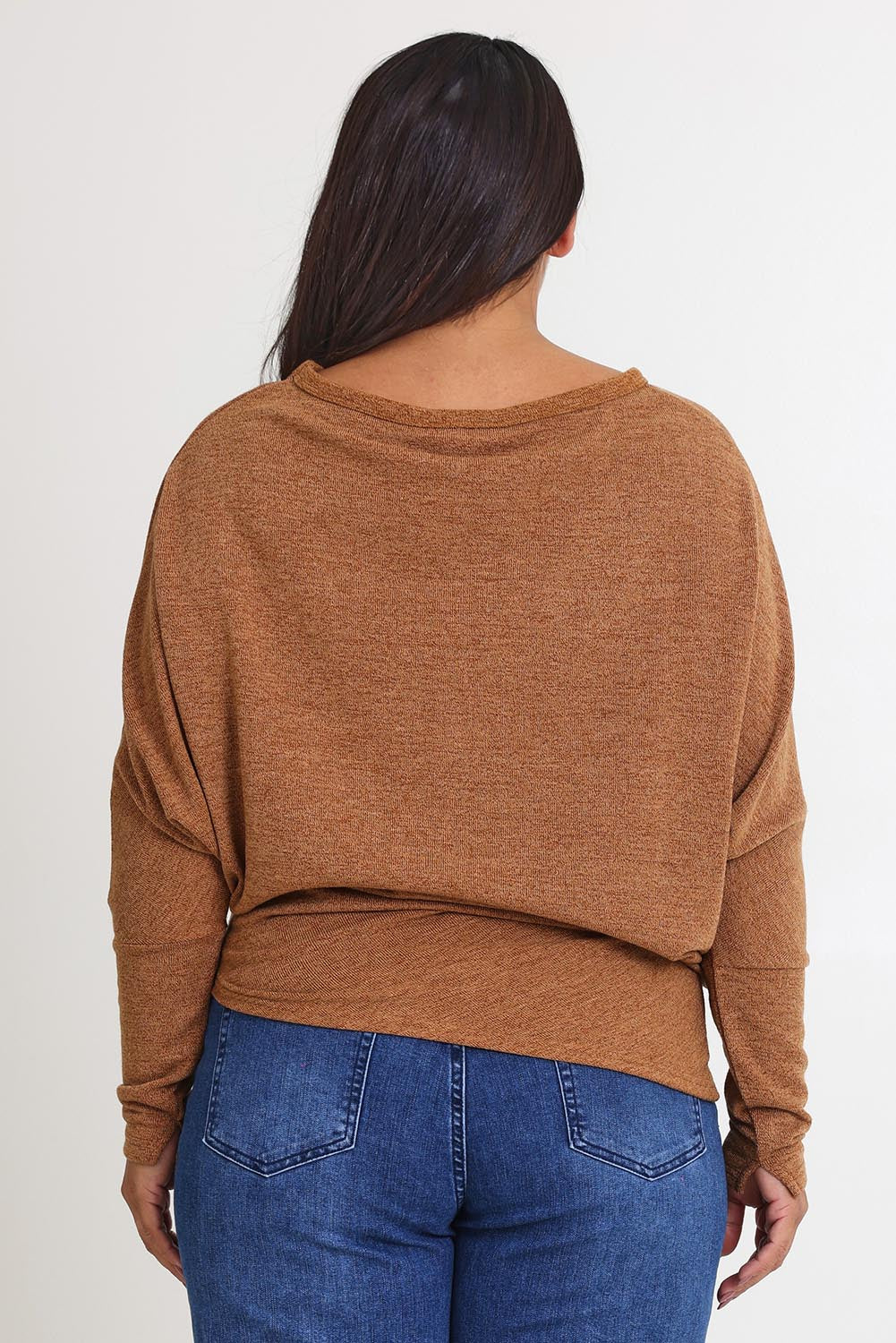 Model Ashleigh wearing size 16 of the Snuggle Up Jumper in colour Coffee, from the back