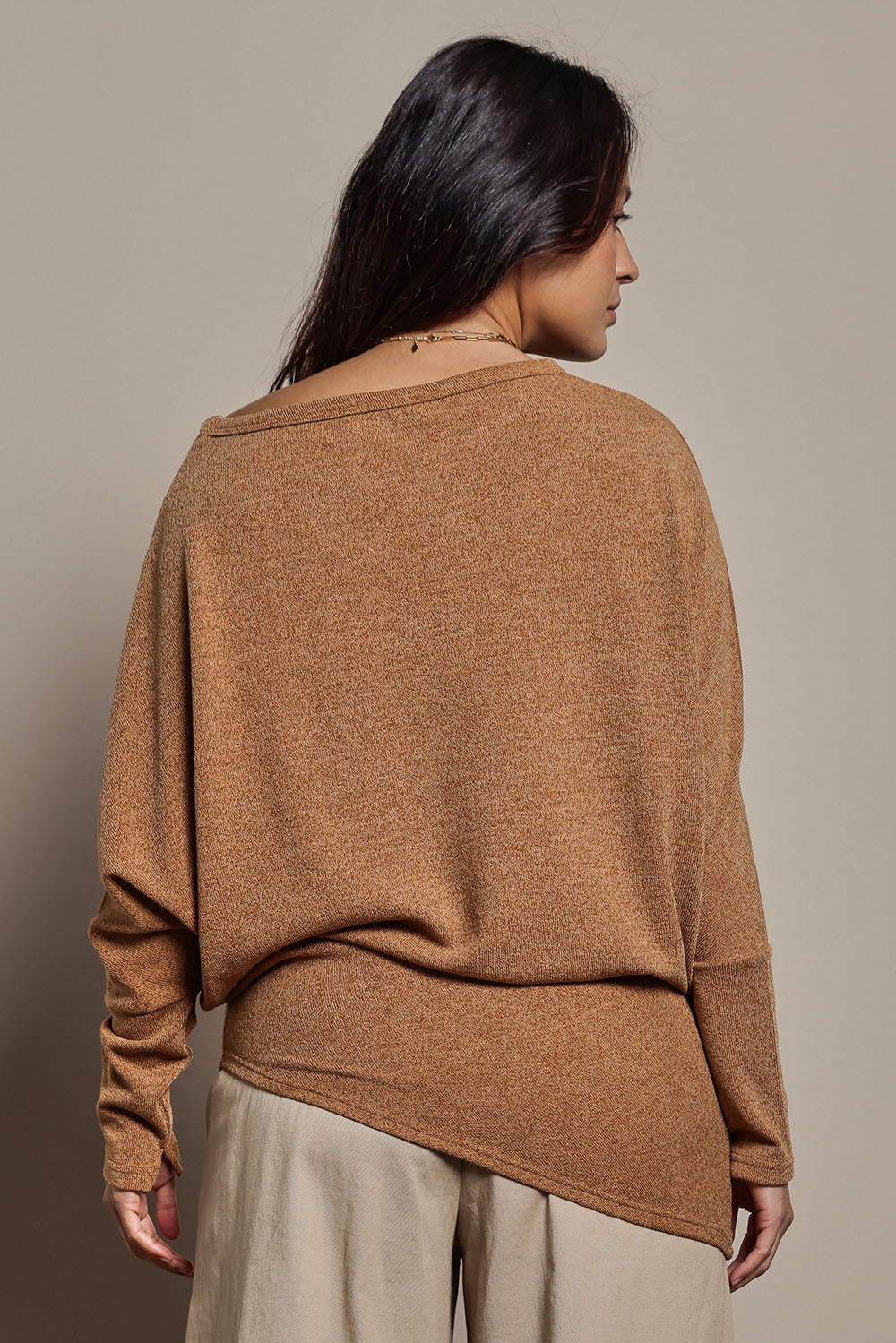 Model Tahnee wearing size 10 of the Snuggle Up Jumper in colour Coffee, from the back