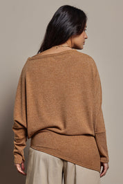 Model Tahnee wearing size 10 of the Snuggle Up Jumper in colour Coffee, from the back