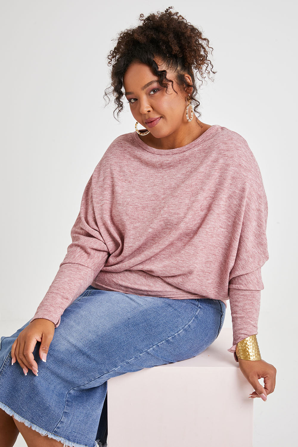 Model Alexis wearing size 16 of the Snuggle Up Jumper in colour Dustypink (Pink), from the front, cropped image