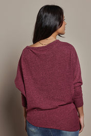 Model Tahnee wearing size 10 of the Snuggle Up Jumper in colour Grape (Purple), from the front, cropped image