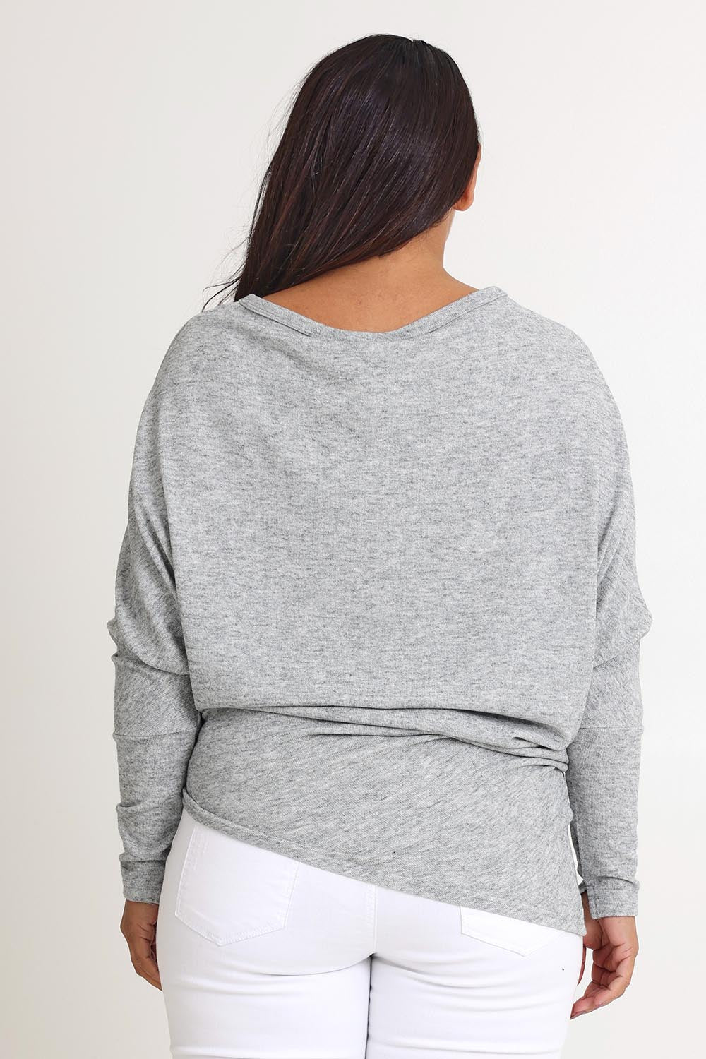 Model Ashleigh wearing size 16 of the Snuggle Up Jumper in colour Greymarl (Grey), from the back