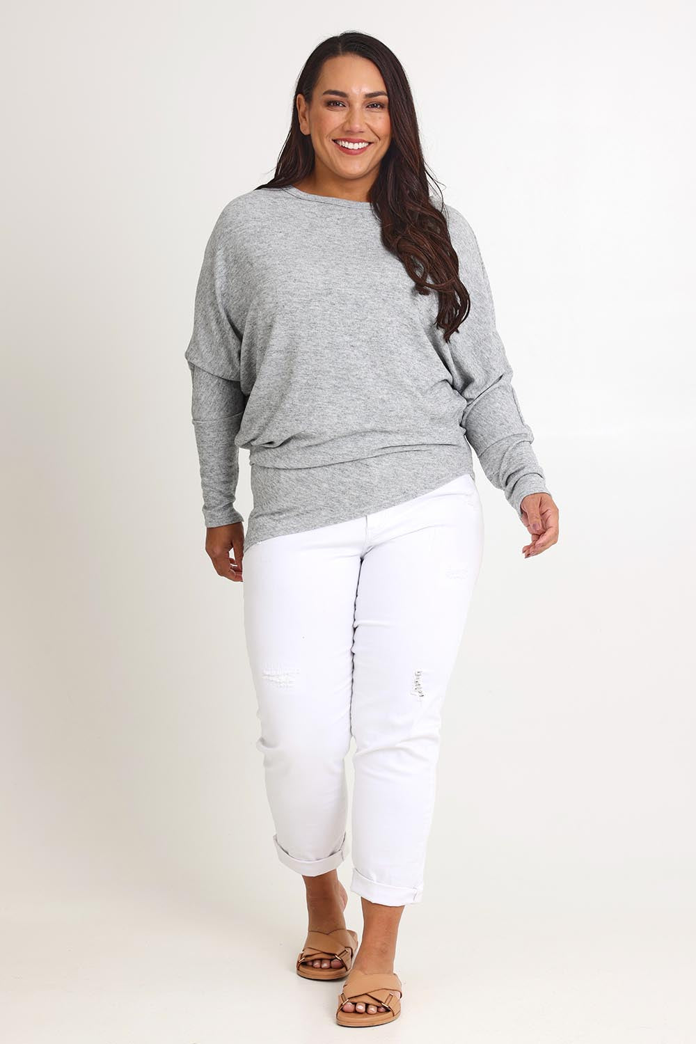 Model Ashleigh wearing size 16 of the Snuggle Up Jumper in colour Greymarl (Grey), from the front, showing the whole outfit