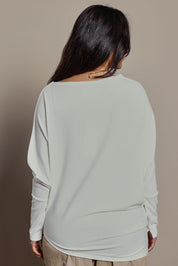 Model Tahnee wearing size 10 of the Snuggle Up Jumper in colour Ivory (White), from the back