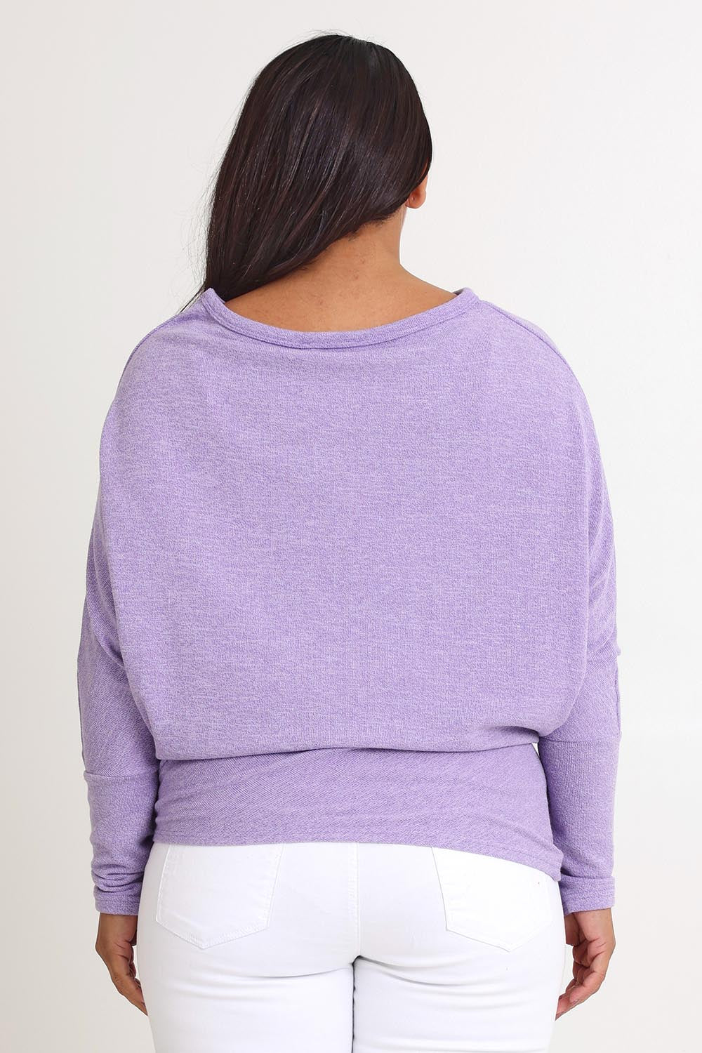 Model Ashleigh wearing size 16 of the Snuggle Up Jumper in colour Lavender (Purple), from the back