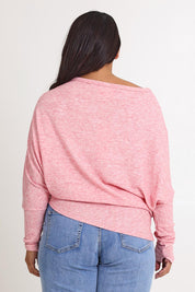 Model Ashleigh wearing size 16 of the Snuggle Up Jumper in colour Pinkmarl (Pink), from the back