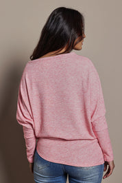 Model Tahnee wearing size 10 of the Snuggle Up Jumper in colour Pinkmarl (Pink), from the back