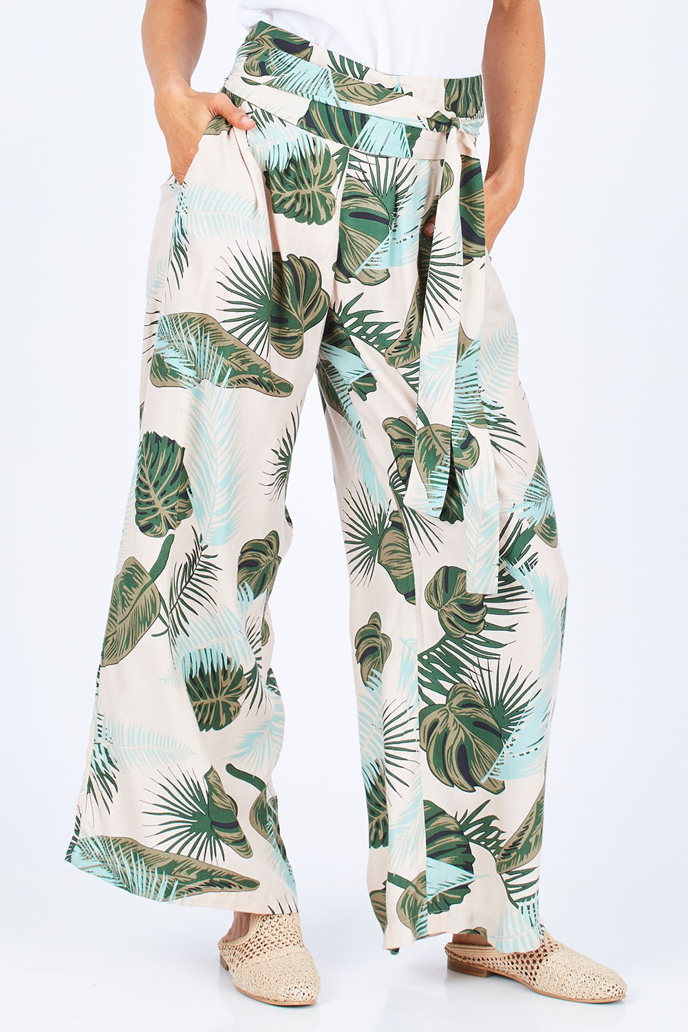 Model Gemma wearing size 10 of the To The Beat Of The Drum Pants in colour PinkFern (Pink), from the front, cropped image