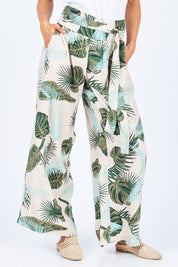 Model Gemma wearing size 10 of the To The Beat Of The Drum Pants in colour PinkFern (Pink), from the front, cropped image