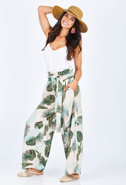 Model Gemma wearing size 10 of the To The Beat Of The Drum Pants in colour PinkFern (Pink), from the front, showing the whole outfit