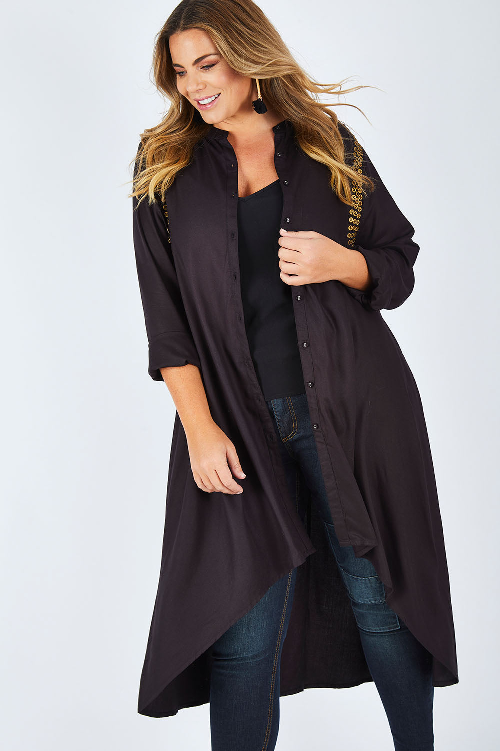 Model Fiona wearing size 16 of the You At My Shoulder Tunic in colour Black (Black), from the front, cropped image