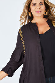 Model Fiona wearing size 16 of the You At My Shoulder Tunic in colour Black (Black), from the front, cropped image