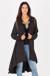 Model Gemma wearing size 10 of the You At My Shoulder Tunic in colour Black (Black), from the front, cropped image