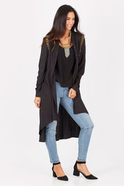 Model Gemma wearing size 10 of the You At My Shoulder Tunic in colour Black (Black), from the front, showing the whole outfit