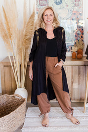 Model Sandy wearing size 12 of the You At My Shoulder Tunic in colour Black (Black), from the front, showing the whole outfit