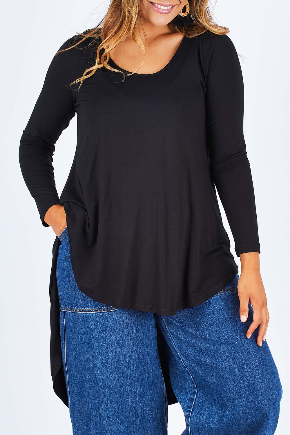 Model Palatina wearing size 14 of the Moonlight Kisses Bamboo Tee in colour Black (Black), from the front, cropped image