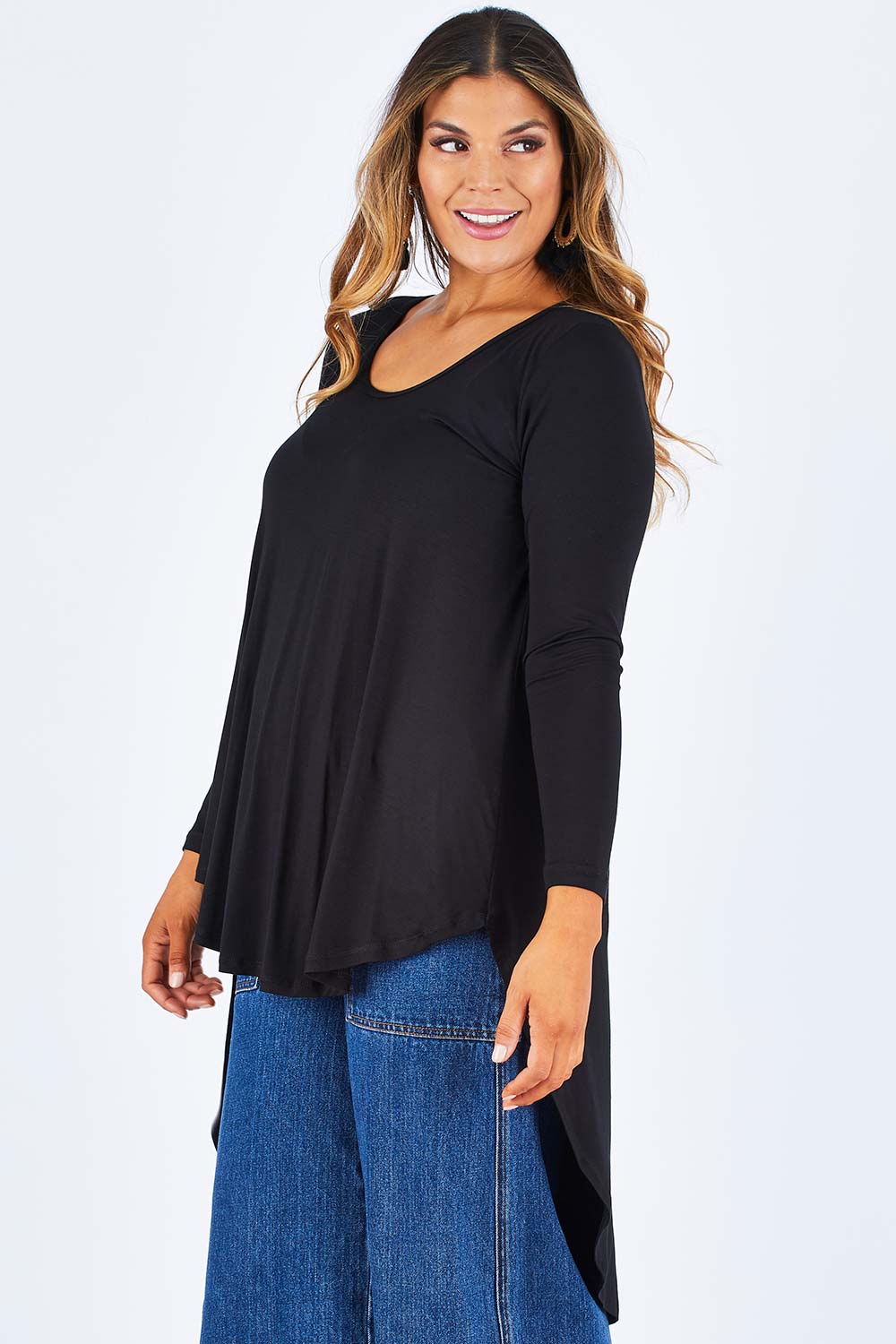 Model Palatina wearing size 14 of the Moonlight Kisses Bamboo Tee in colour Black (Black), from the front, cropped image