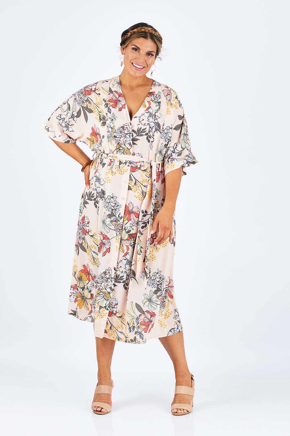 Model Palatina wearing size 14 of the Floating Through The Day Dress in colour Blush (Pink), from the front, showing the whole outfit