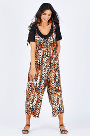 Model Gemma wearing size 10 of the Oh The Places You Will Go Jumpsuit in colour Leopard, from the front, showing the whole outfit