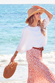 Model Marnee wearing size 10 of the Flow With Me Slouch Top in colour White (White), from the front, showing the whole outfit
