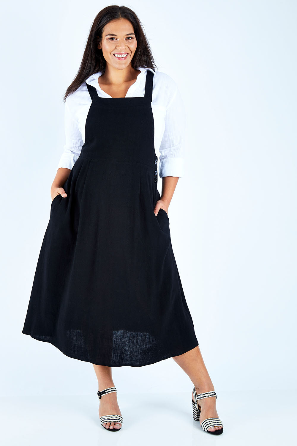 Model Lauren wearing size 18 of the Flow With Me Slouch Dress in colour Black (Black), from the front, showing the whole outfit