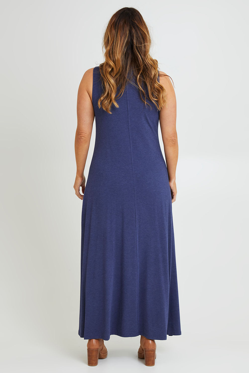Model Laura wearing size 14 of the My Faithful Maxi Singlet Dress in colour Marledenim (Blue), from the back