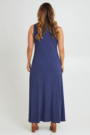 Model Laura wearing size 14 of the My Faithful Maxi Singlet Dress in colour Marledenim (Blue), from the back