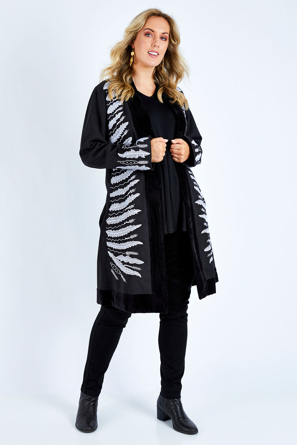 Model Jess wearing size 14 of the Flight Of The Feather Embroidered Jacket in colour Storm (Black), from the front, showing the whole outfit