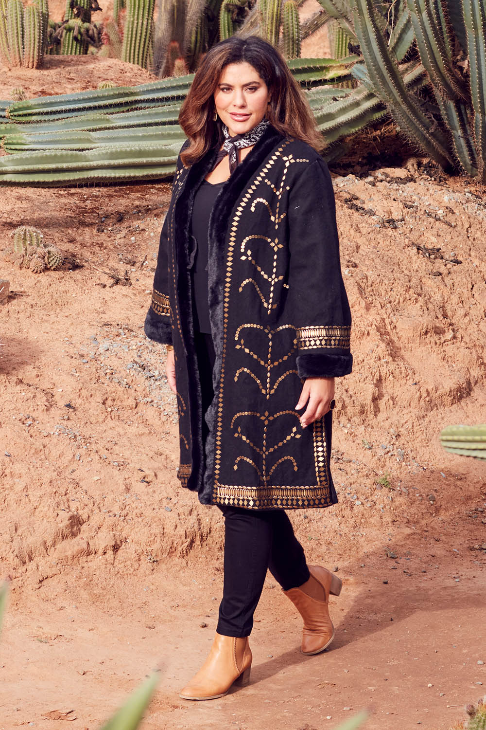 Model Jess wearing size 14 of the Warm My Heart Applique Jacket in colour Black (Black), from the front, showing the whole outfit